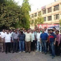 Protests against the raids at a market in Delhi. Credit DQ Week