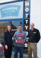 Cartridge World Evesham owners Penny and Richard Jones, with competition winner Ali Adlkish (centre). Credit: Tewkesbury Ad Mag