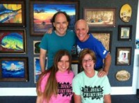 Keith Dreier (top right) with St. Johns Printing and Cartridge World staff Credit: The St Augustine Record