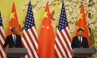 President Obama and President Jinping Credit: Greg Baker/AFP/ Getty Images via The Guardian