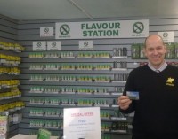 Richard Jones with one of the loyalty cards (Credit: Tewkesbury Ad Mag)