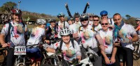 he 2014 Rhino Ride team takes a quick photo at the start of the two-day, 70 kilometre charity bike ride