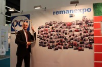 OCP's Carsten Edelmeier in front of the company's photo wall