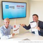 123business and Ricoh sign partnership agreement